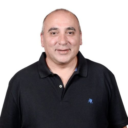 Retrato oficial del diputado nacional José Peluc, con chomba negra sobre fondo blanco